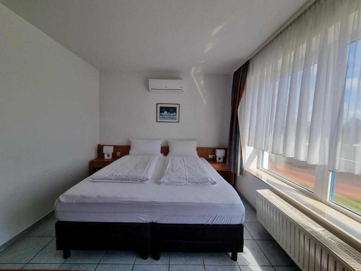 Erbenholz Hotel Laatzen Bagian luar foto